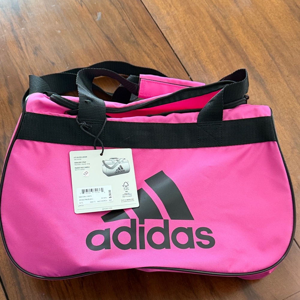 NWT Adidas Bold Pink Travel Bag. Bonus cosmetic bag.